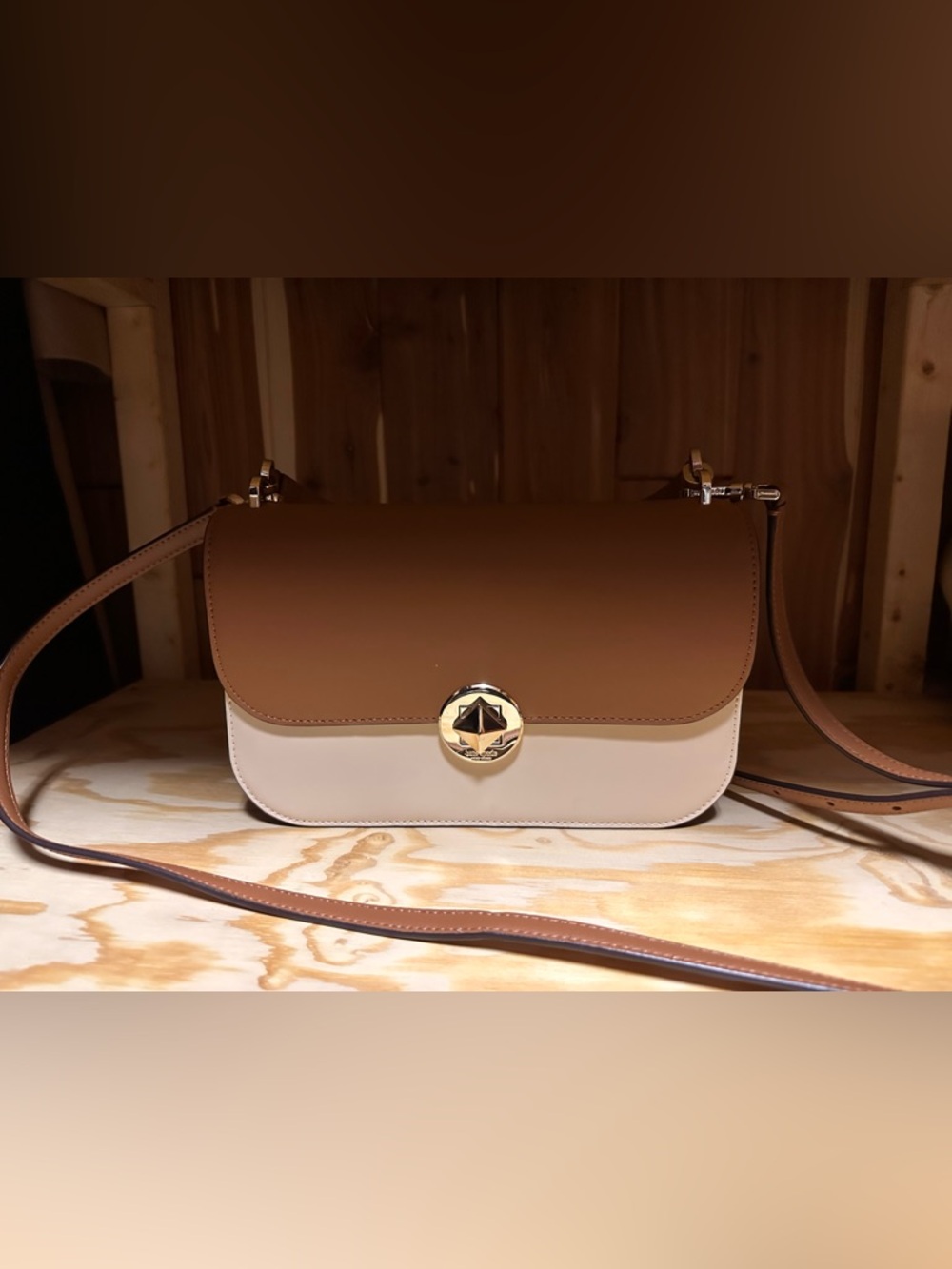 KATE SPADE Two-Tone Brown and Cream Crossbody Bag with Gold Twist Lock